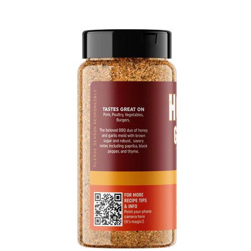 Fire & Smoke Society F&S | HONEY GARLIC BBQ RUB 9.5 OZ, a clear plastic jar filled with a honey garlic seasoned barbecue rub, featuring a black lid and a maroon and yellow label with product description and QR code.
