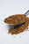 Fire & Smoke Society F&S Thundering Longhorn Beef Rub, a 12.5 oz container with seasoned beef rub spice mixture in a metal scoop on white background.