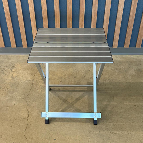 PK Grills Aluminum Compact Foldable Table, portable and lightweight table with aluminum slat surface and foldable functionality for easy transport and storage.
