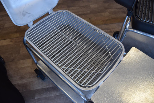 PK Grills Stainless Steel Cooking Grid & Charcoal Grate for Original PK, stainless steel cooking grid and charcoal grate placed on a grill table.