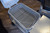 PK Grills Stainless Steel Cooking Grid & Charcoal Grate for Original PK, stainless steel cooking grid and charcoal grate placed on a grill table.