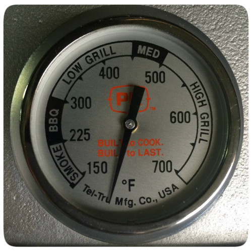 Tel-Tru The PK BBQ Thermometer, round cooking thermometer with temperature gauge from 150 to 700°F, featuring various grill and smoke settings, and the brand's logo in the center.